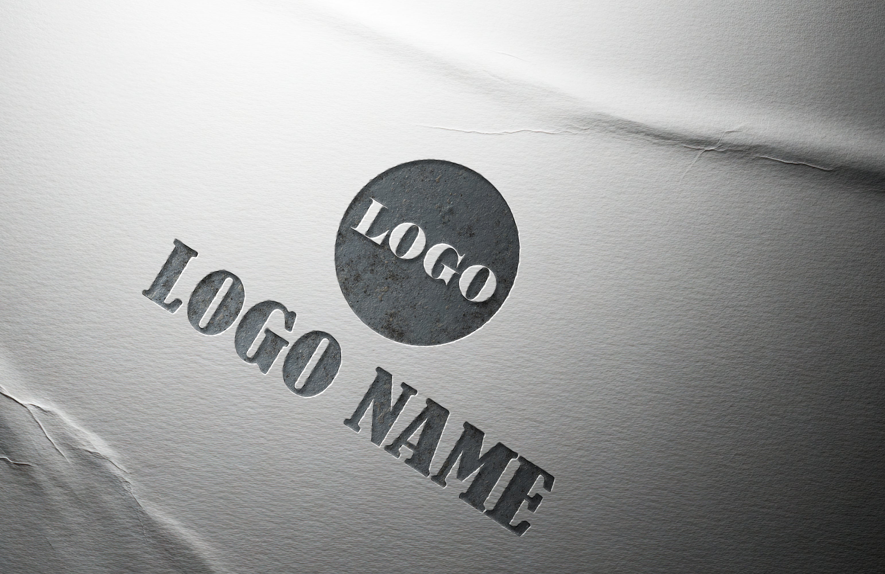 Cut Out Logo Mockup on White Paper Texture